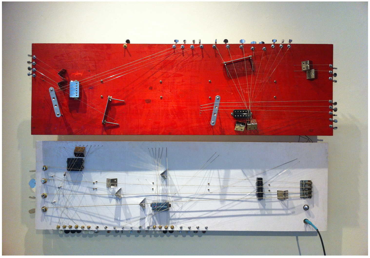 Artist Name: Bani Haykal | Country: Singapore Artwork Name: “The Americans have colonised our subconscious" | Dimensions: 130 x 87 x 7 cm | Medium: Enamel paint, electric guitar & bass pickups, machine heads, guitar bridge, guitar and bass strings | Nominator's Name: Weng Choy Lee