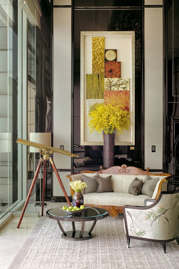 This large oil on canvas by American artist T. Bumiler adds a splash of colour to the neutral palate of the room.