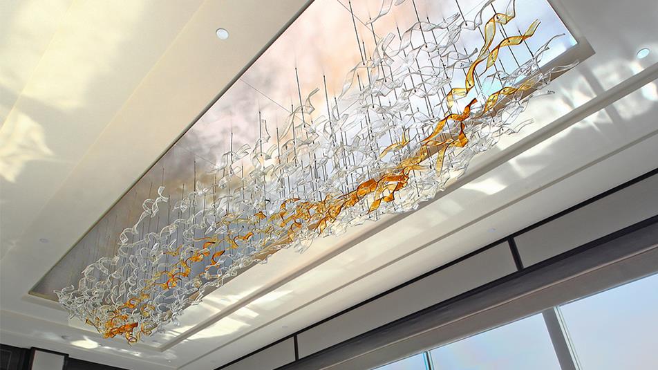 The hand-blown Lasvit-Bohemian glass chandelier is suspended as so as to emulate birds in flight.